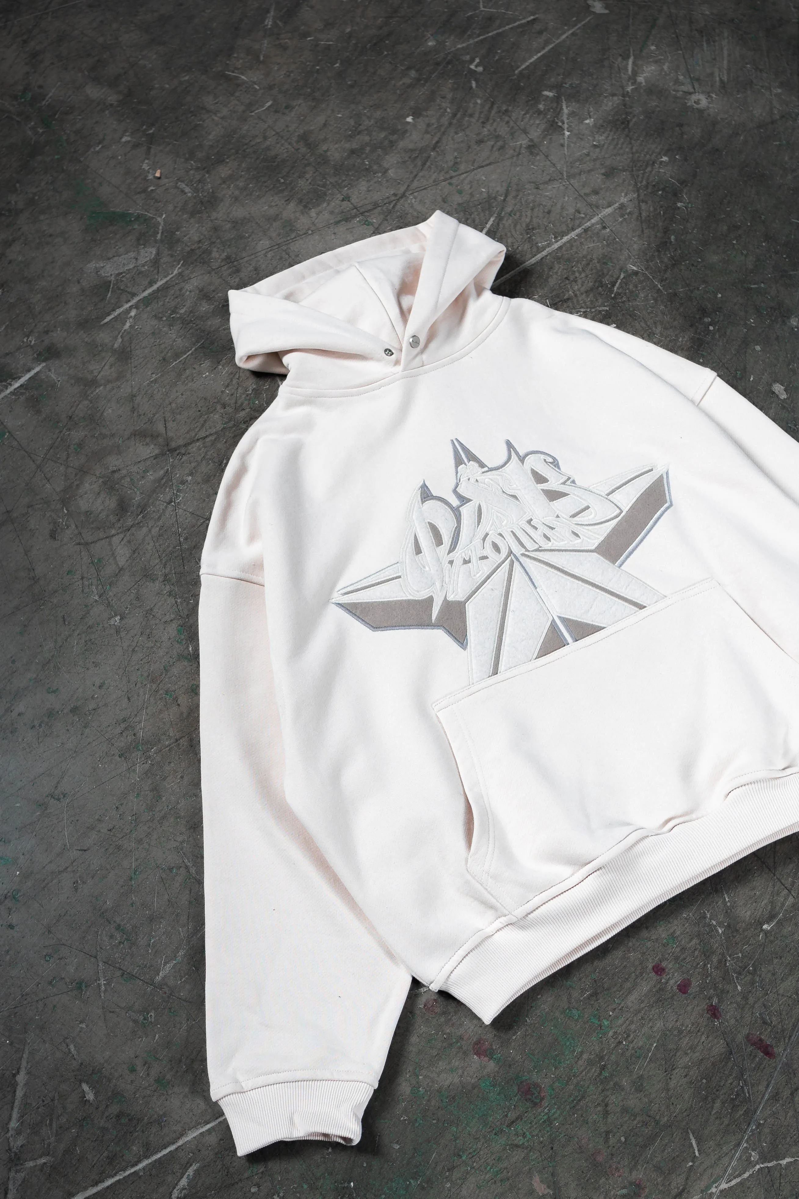 CYRILLIC STAR OFF WHITE SNAP BUTTON HOODIE